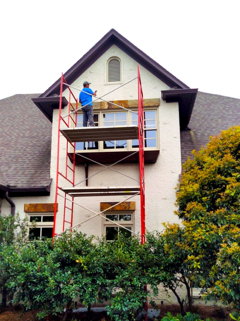 Exterior Renovations project concerning painting the exterior of a home